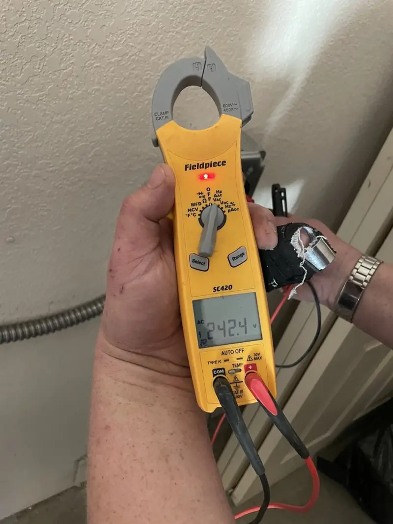 Voltage testing with clamp meter during Circuit Breaker Repair in Pleasant Grove